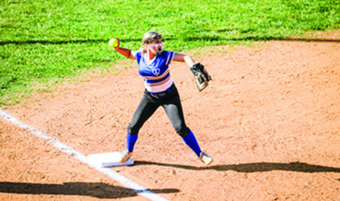 Thomas Walker’s Kaylee Golden makes a throw from third base during Monday action in Ewing.