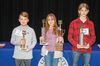 The top spellers at the Lee County Spellling Bee are shown, left to right: Maddox McQueen - third place, Bethany Singleton - first place, and Aurora Hart - second place. The annual Spelling Bee was held on March 7 with 25 rounds required to declare a champion.